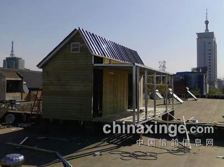 �����ǧ �½���ľ̨ʽ����(ͼ)